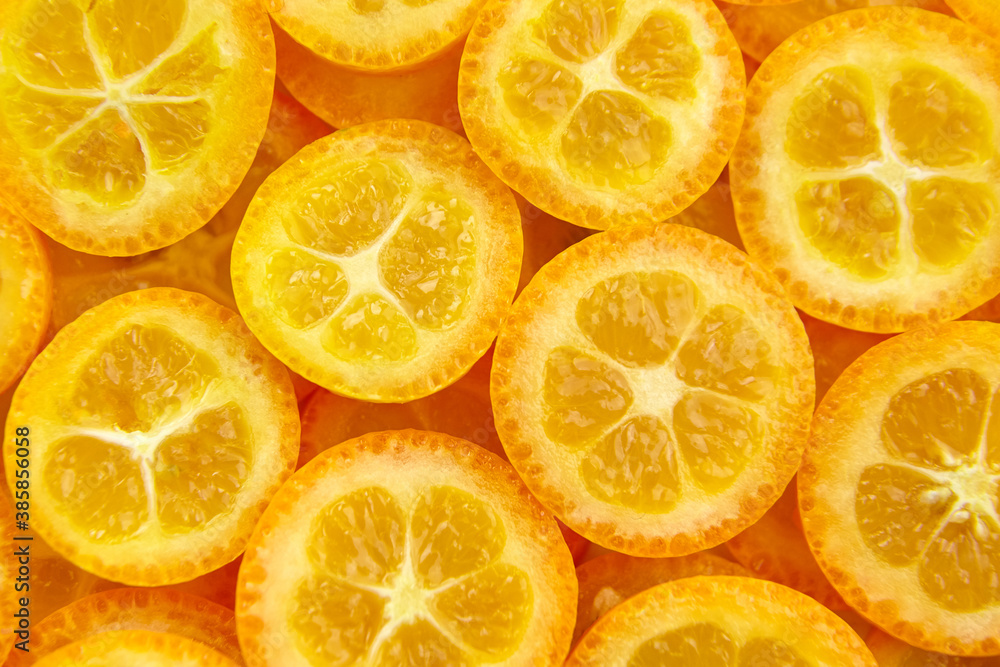 kumquat citrus fruit slices background kumquat citrus fruit slices background