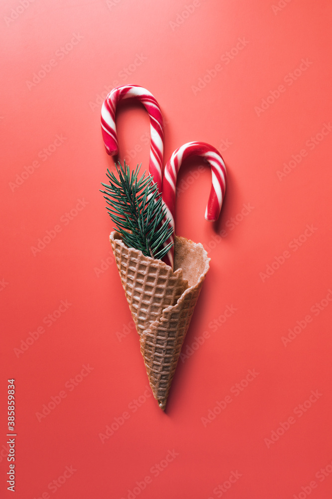 Φωτογραφία Christmas composition of lollipops, branches of a Christmas tree and New Year's toys