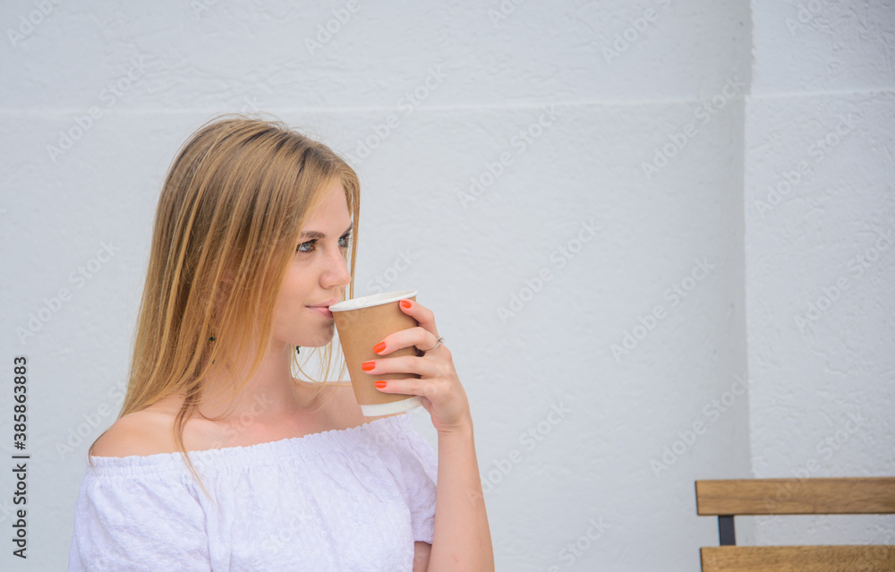 Coffee to go. Takeaway. Coffee in paper cup. Girl drinks coffee outdoor. Hot tea. Hot drinks. Espresso, latte, cappuccino. Coffee to go. Takeaway. Coffee in paper cup. Girl drinks coffee outdoor. Hot tea. Hot drinks. Espresso, latte, cappuccino.