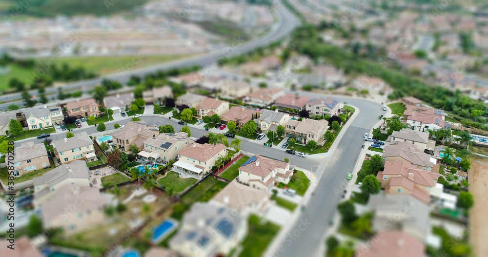 Aerial View of Populated Neigborhood Of Houses With Tilt-Shift Blur - obrazy, fototapety, plakaty 