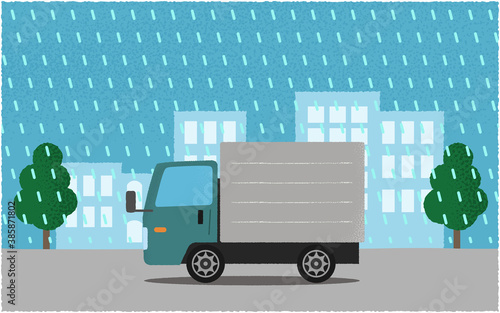豪雨の中、都市の道路を進む緑色のトラックのベクターイラスト