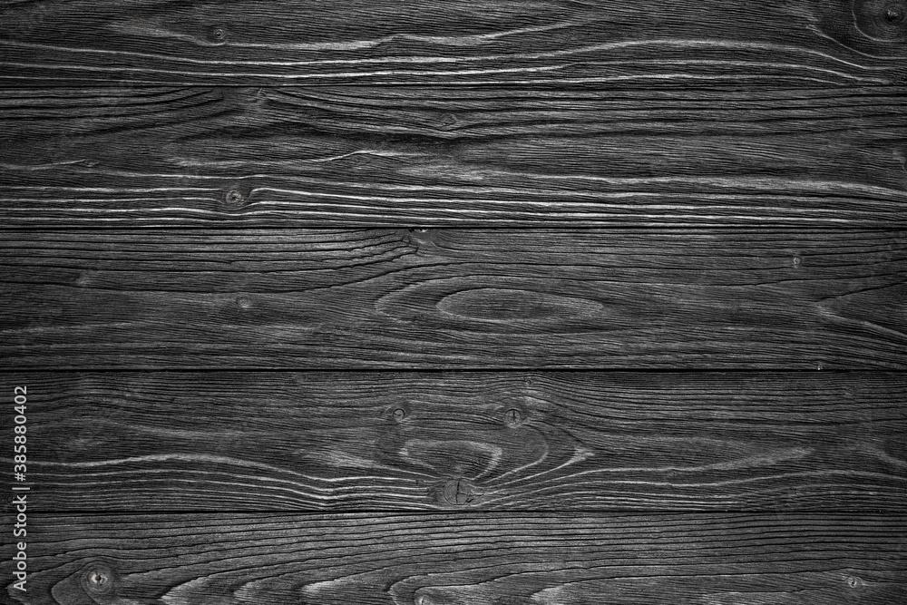 Obraz premium Black natural wooden texture background. Hand made Photography wooden background for photo. Aged tree texture after wood brushing.