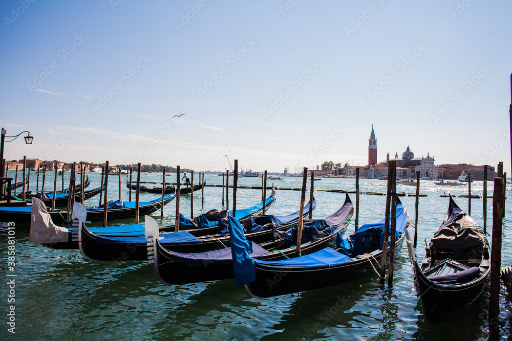 The famous gondolas parked in the harbour in Venice, Italy