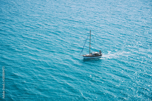 Ship in the blue sea © sashapritchard