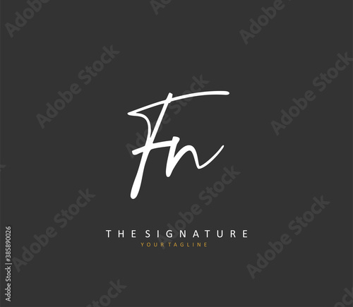 F N FN Initial letter handwriting and signature logo. A concept handwriting initial logo with template element.