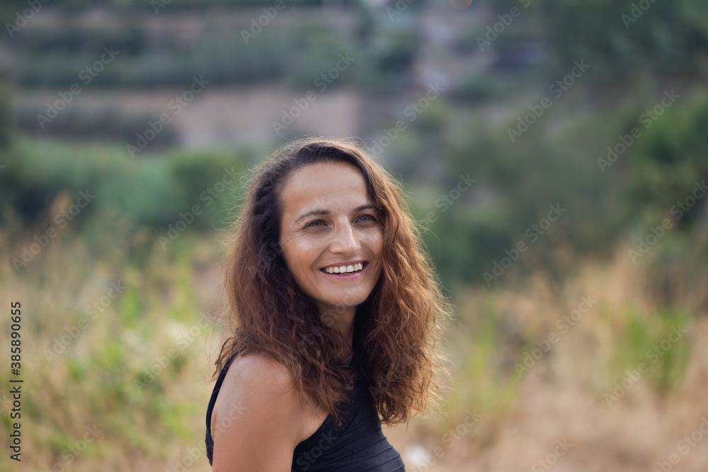 Authentic portrait of smiling brunette female Authentic portrait of smiling brunette female