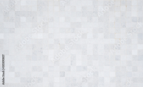 Closeup shot of tile mosaic white and gray pattern background.