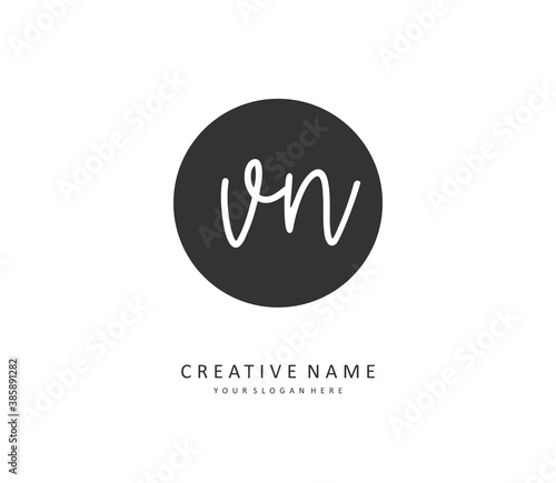 V N VN Initial letter handwriting and signature logo. A concept handwriting initial logo with template element.