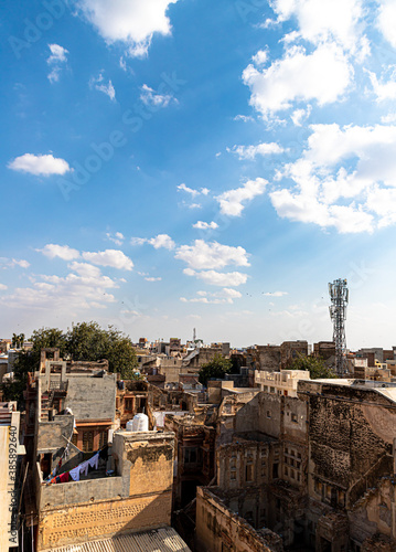 ariel view of a old bikaner city ariel view of a old bikaner city and dramatic clouds with blue sky