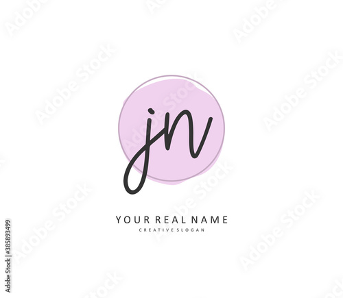 J N JN Initial letter handwriting and signature logo. A concept handwriting initial logo with template element.