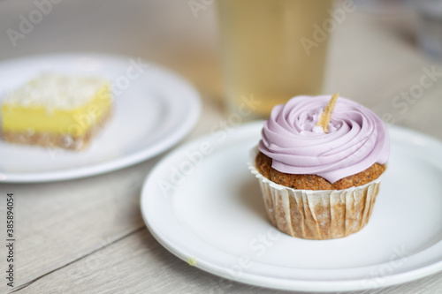 Purple iced vegan and gluten-free cupcake