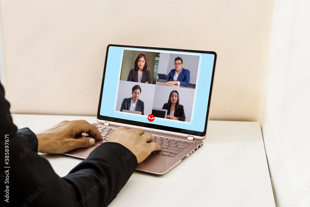 business people Working From Home Having Online Group Videoconference On Laptop business people Working From Home Having Online Group Videoconference On Laptop