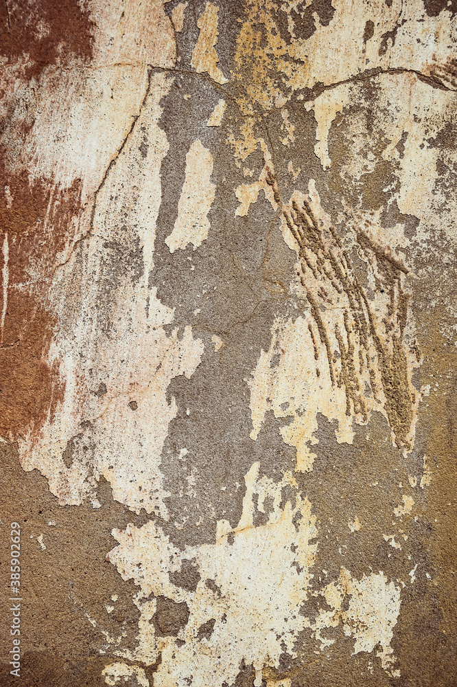 Fototapeta premium Cracked and peeling paint old wall background.