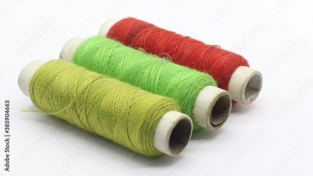 Thread rolls on white background