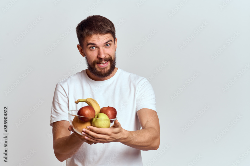 man with fresh fruit in a glass cup gesturing with hands vitamins health energy model bushy beard mustache man with fresh fruit in a glass cup gesturing with hands vitamins health energy model bushy beard mustache