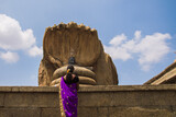A women worshiping shiva linka