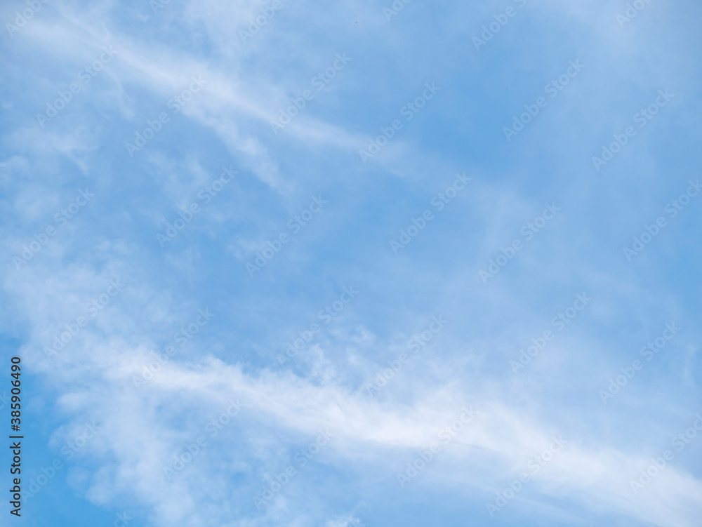 White clouds on a blue sky background. White clouds on a blue sky background.