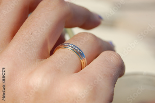 hands of bride and groom with wedding rings