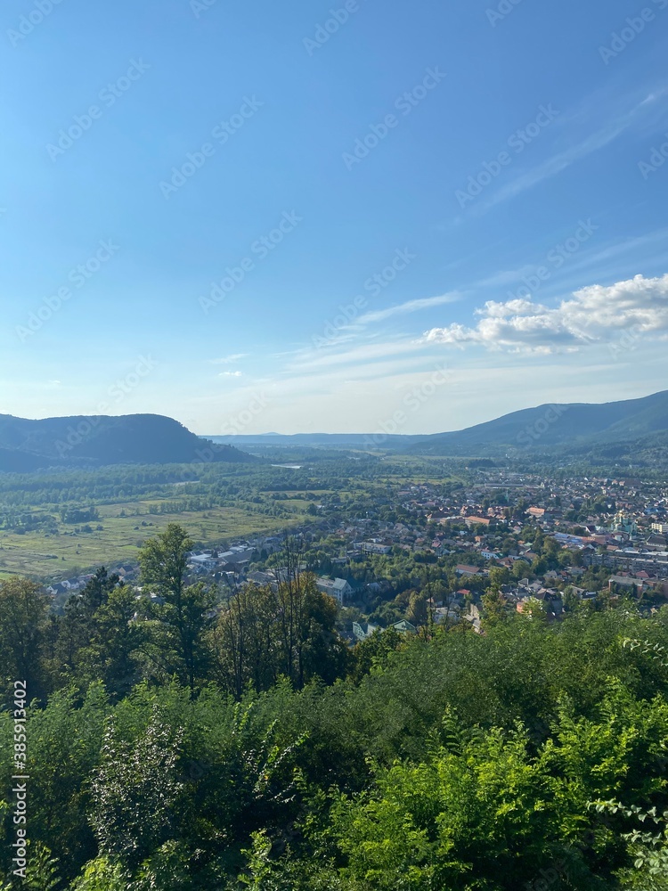 Naklejka premium clouds over the mountains