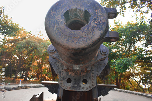 A cannon captured from back situated in cannon hill in Mumbai photo