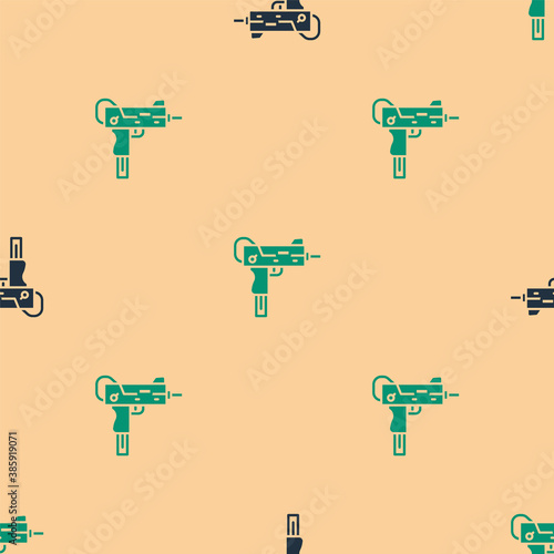Green and black UZI submachine gun icon isolated seamless pattern on beige background. Automatic weapon. Vector.