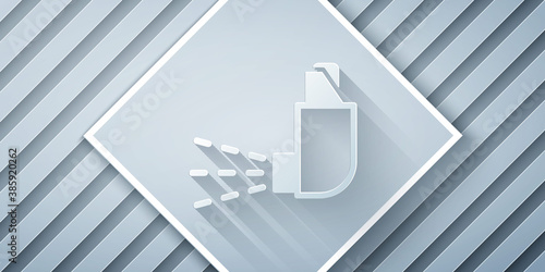 Paper cut Inhaler icon isolated on grey background. Breather for cough relief, inhalation, allergic patient. Medical allergy asthma inhaler spray. Paper art style. Vector.