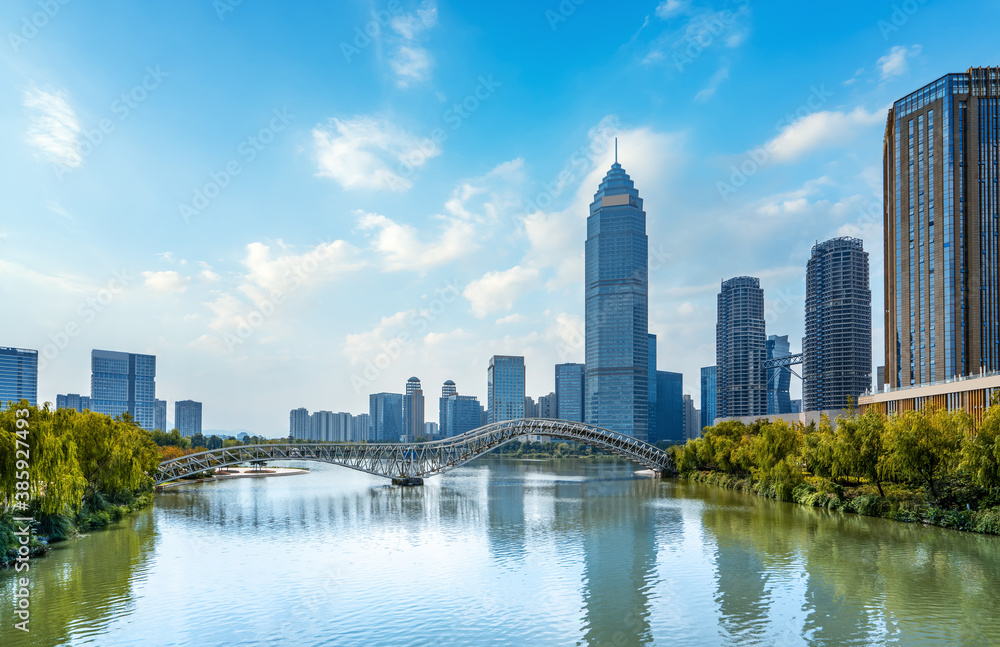 Obraz premium Modern city high-rise buildings, night view of Shaoxing Central Business District, China.