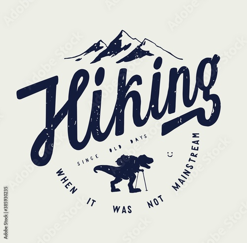 Hiking Dino. T-rex dinosaur with a backpack traveling in the mountains. Vintage lettering t-shirt print.