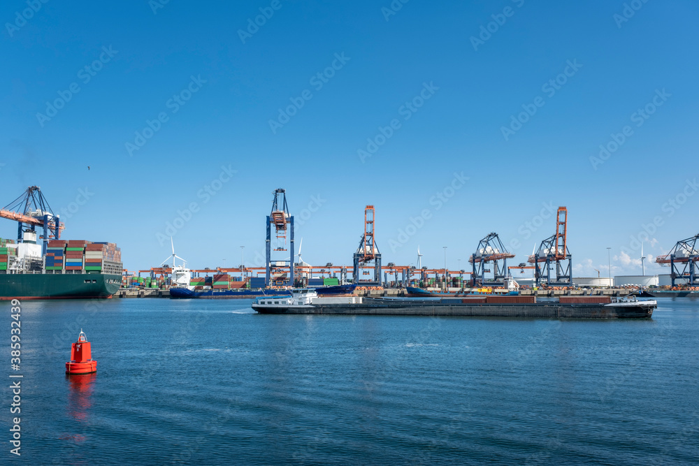 Logistics and transportation of Container Cargo ship and Cargo plane with working crane bridge in shipyard and transport industry