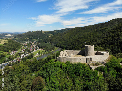 Ruins of Medieval Castle in Mountains in summer. Beskid Sadecki, near village Rytro, Poland. photo