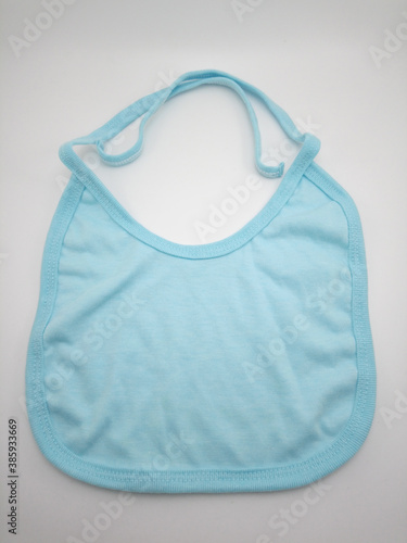 Baby bib use to tie between the chest and neck part photo