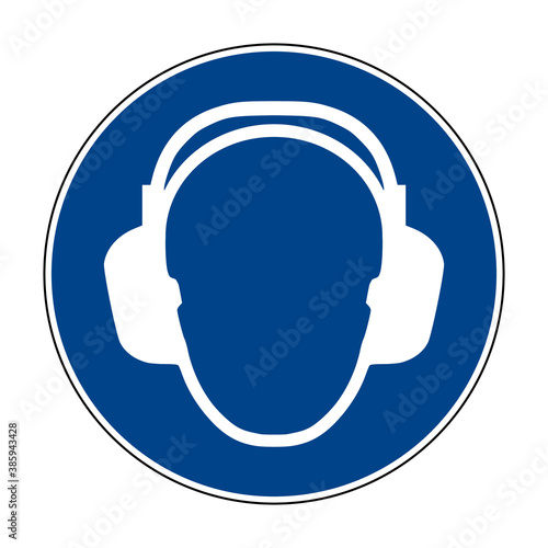Wear ear protection sign. Vector illustration of circular blue sign with human head wearing headphones icon inside. Hearing protection symbol isolated on white background. Caution noise.
