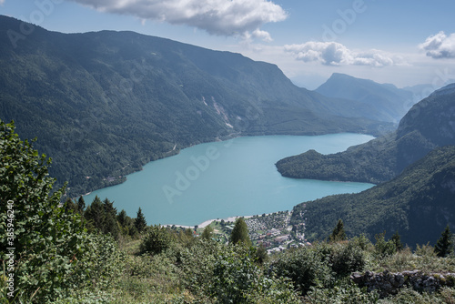 Molveno Lake  located in Trentino  by Molveno village  surrounded by Brenta group in the west   Gazza   Pagenella mountains in the south   east  as seen from Pradel high plain  Dolomites  Italy