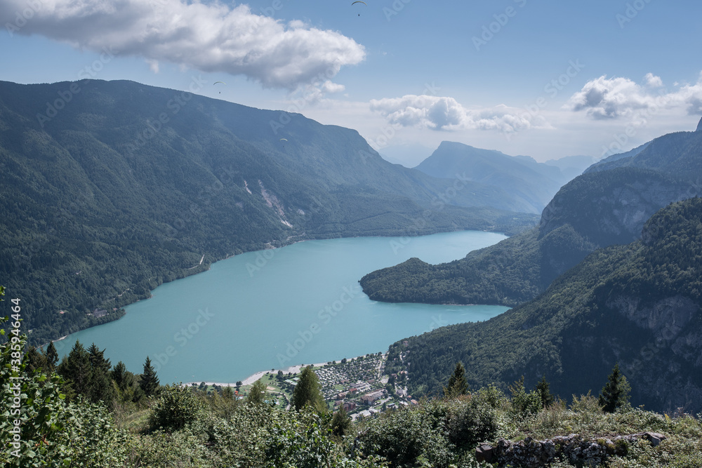 Molveno Lake, located in Trentino, by Molveno village, surrounded by Brenta group in the west & Gazza & Pagenella mountains in the south & east, as seen from Pradel high plain, Dolomites, Italy
