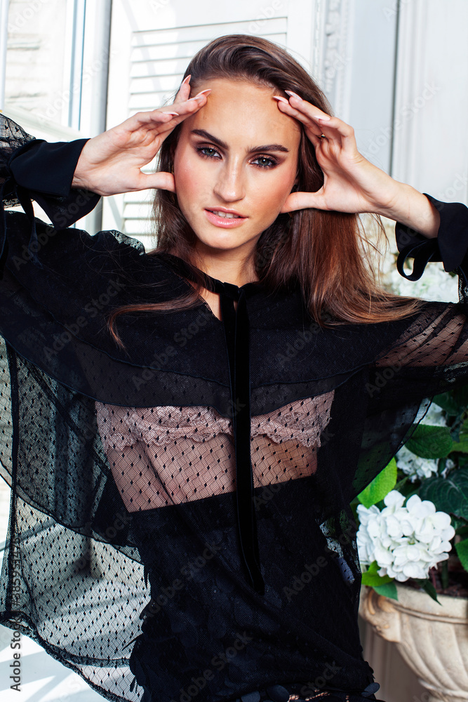 young pretty lady in black lace fashion style dress posing in rich interior of royal hotel room, luxury lifestyle people concept young pretty lady in black lace fashion style dress posing in rich interior of royal hotel room, luxury lifestyle people concept