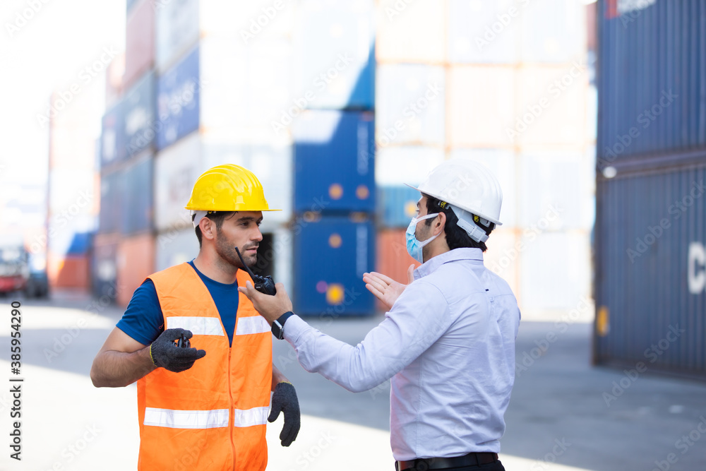 Foreman ask man worker put on face mask protect coronavirus. Man worker refuses does not wearing face mask. protest against COVID-19 control measures