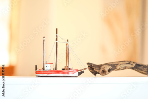 Small toy ship on display in bed and breakfast holiday accommodation