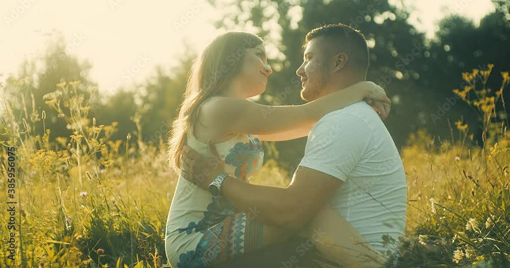 Couple lovers hugging and kissing in the park at sunset. Love, youth, happiness concept. Health care, authenticity, sense of balance and calmness. 4K slow motion
Couple lovers hugging and kissing in the park at sunset. Love, youth, happiness concept. Health care, authenticity, sense of balance and calmness. 4K slow motion