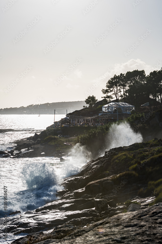 Strong sea crashing against the rocks of the Grove coastline in Galicia, Spain.
