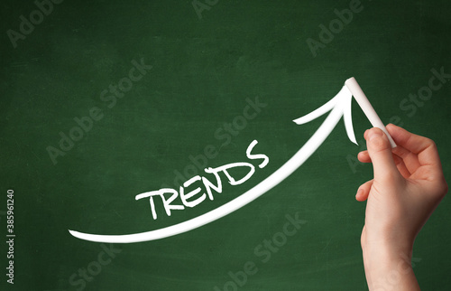 Wallpaper Mural Hand drawing TRENDS inscription with white chalk on blackboard, business concept Torontodigital.ca