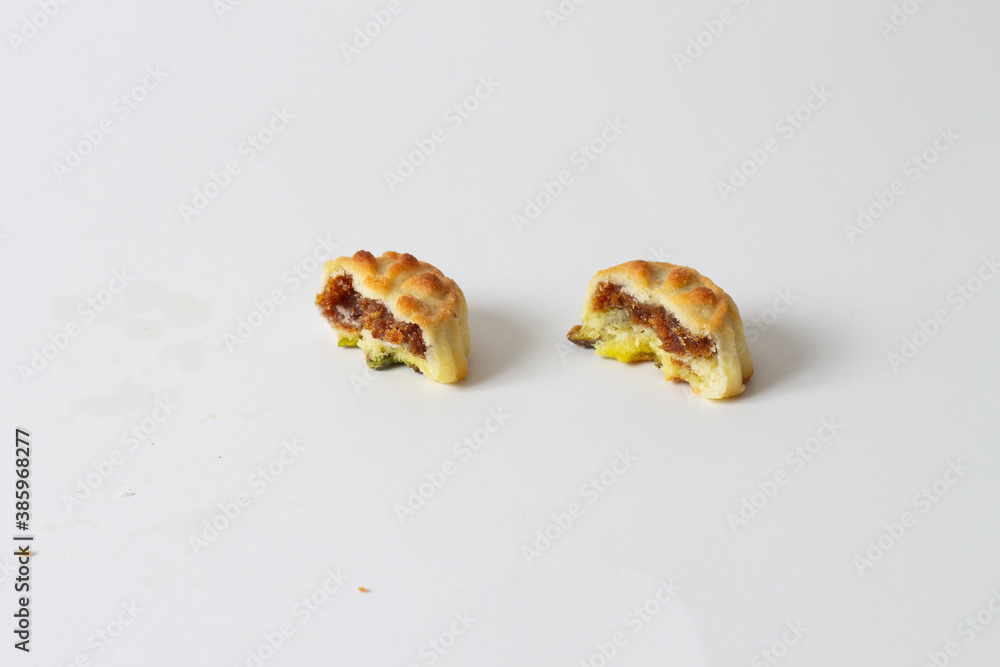 arabic oriental cookies dates maamoul eid and ramadan sweet isolated on white background
arabic oriental cookies dates maamoul eid and ramadan sweet isolated on white background