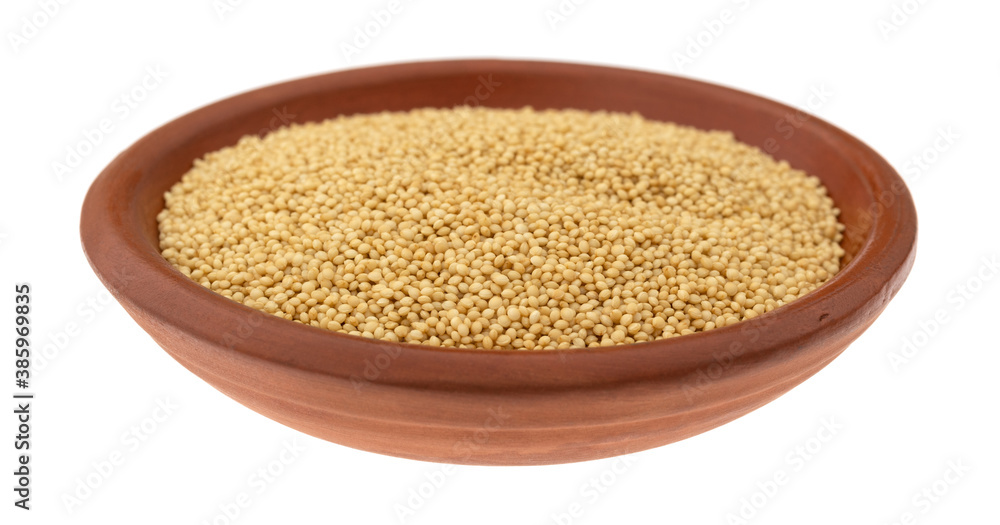 Side view of amaranth seeds in a small bowl isolated on a white background. Side view of amaranth seeds in a small bowl isolated on a white background.