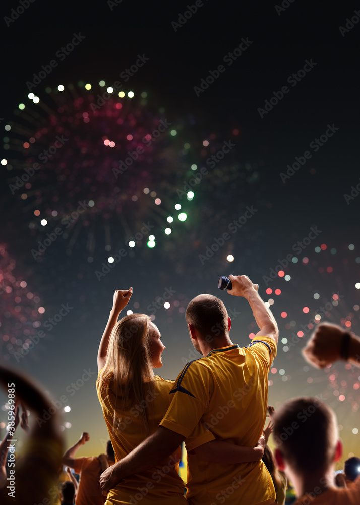 Fans celebrate in Stadium Arena night fireworks Fans celebrate in Stadium Arena night fireworks