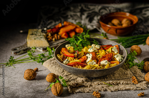 Homemade pasta with roasted pumpkin and blue cheese