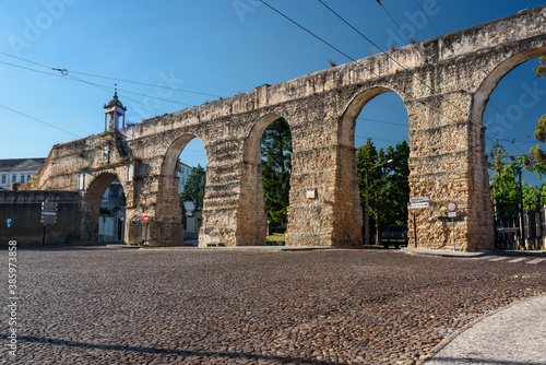 landmarks of Portugal -view of the roman acquedcut in old town of Coimbra. summer 2019