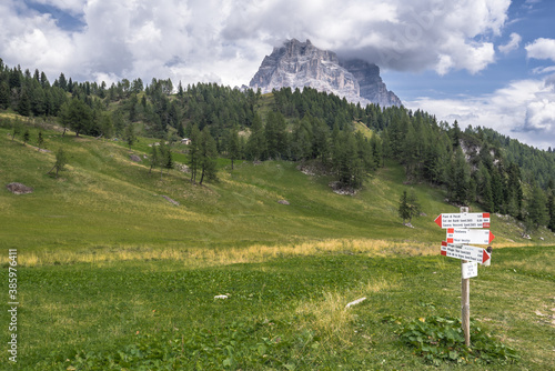 Monte Pelmo, a mountain of the Dolomites, resembles a giant rock, isolated from other peaks, as seen from Col dei Baldi (Baldi pass) above Alleghe village, Province of Belluno, South Tirol, Italy.