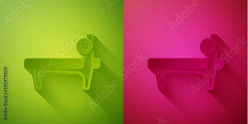 Paper cut Bench with barbel icon isolated on green and pink background. Gym equipment. Bodybuilding, powerlifting, fitness concept. Paper art style. Vector.
