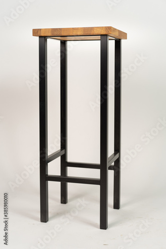 Metal bar chair with wooden seat