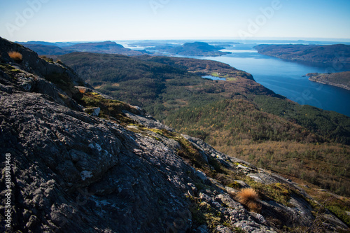 Beautiful nature view with fjord and mountains. Hiking trail vantage point. Location: Scandinavian Mountains, Norway.