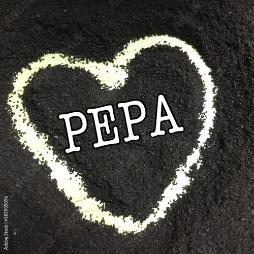 An outline of a heart on a black background with the word pepa photo